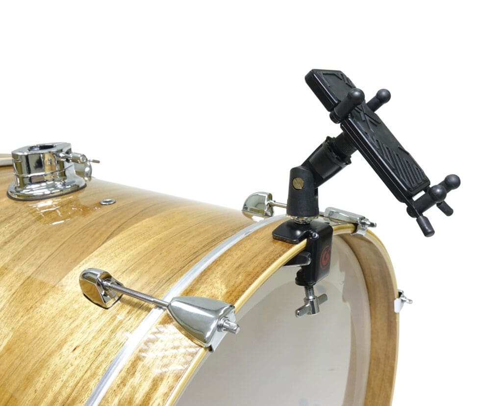 A drum holder attached to a wooden drum.