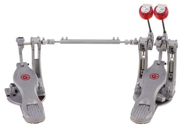 A pair of drum pedals on a white background.