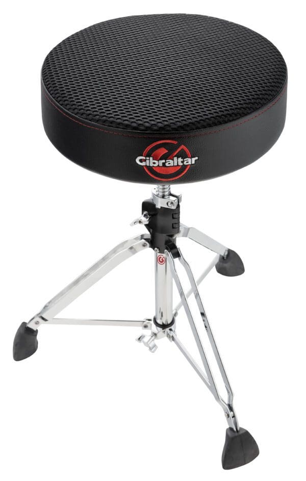 A black drum stool on a white background.