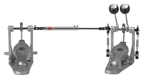 A pair of drum pedals on a white background.