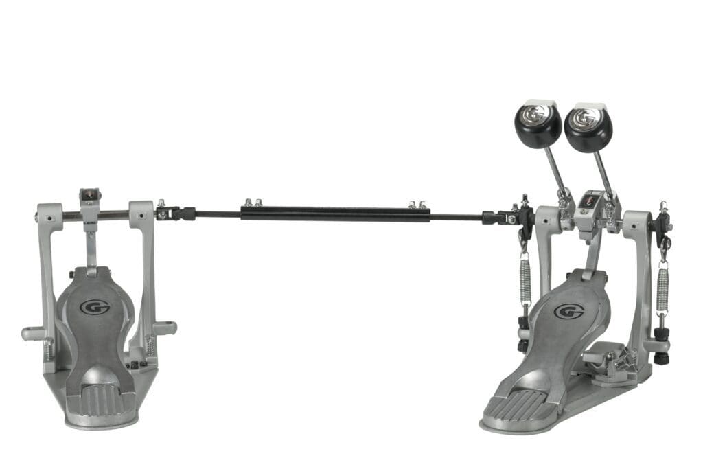 A pair of drum pedals on a white background.