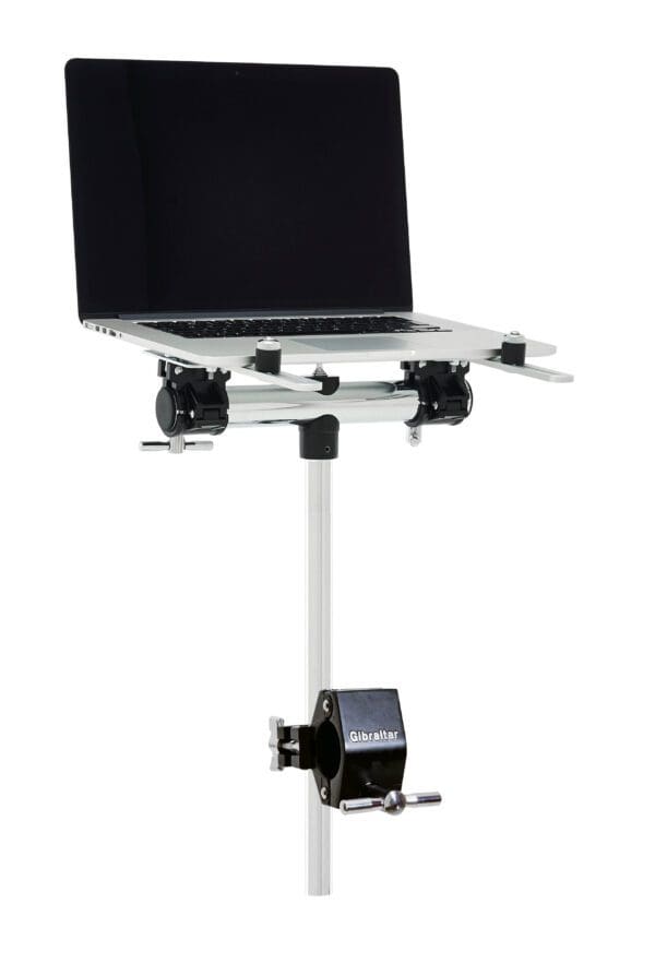 A laptop is sitting on top of a stand.