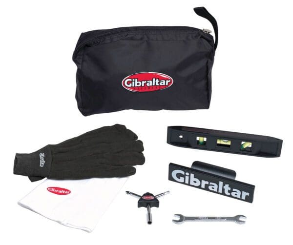 A black bag with a tool kit and other items.