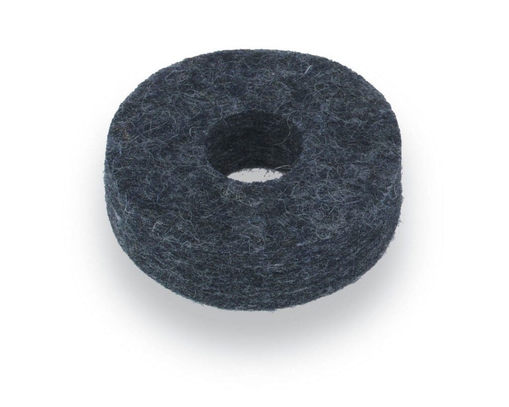 A black felt ring on a white surface.