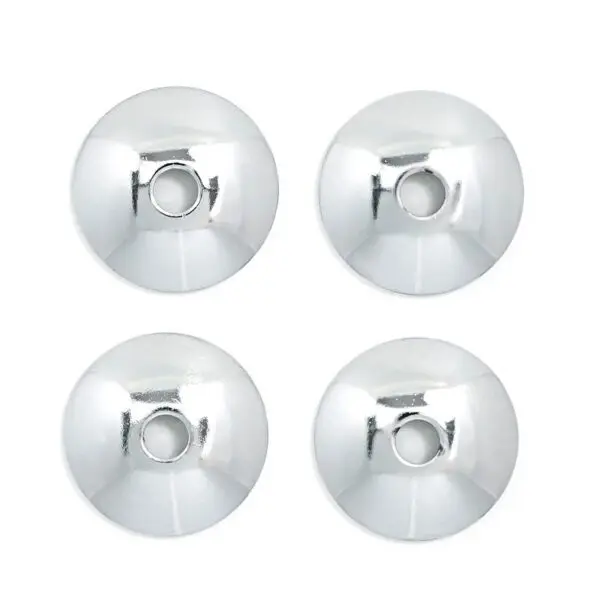 Four chrome metal knobs on a white background.