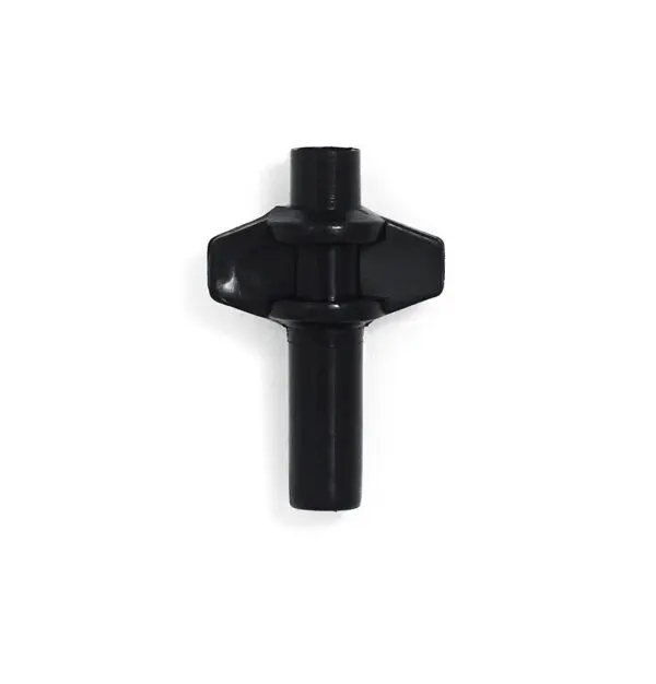 A black plastic cross on a white background.