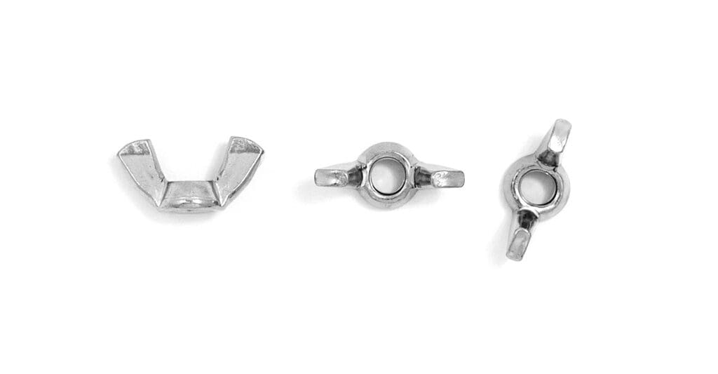 A pair of silver plated earring clips on a white background.