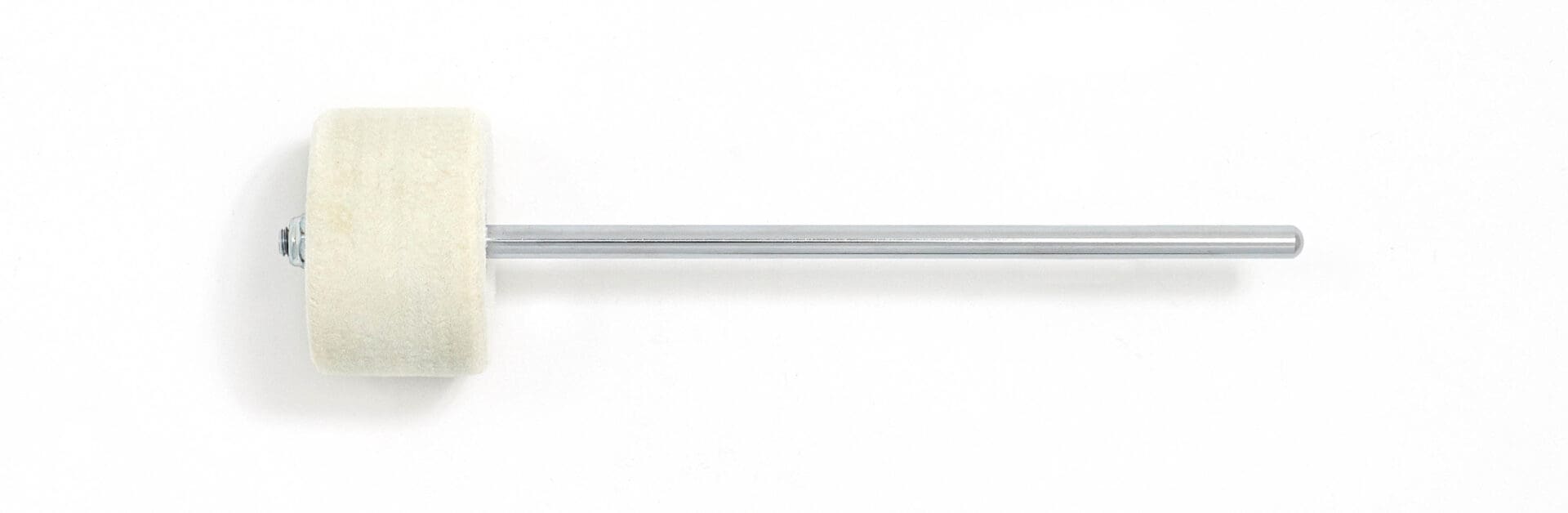 A white brush with a white handle on a white surface.