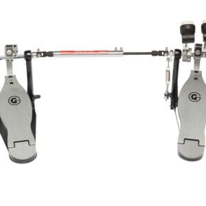 A metal drum pedal with a red knob.