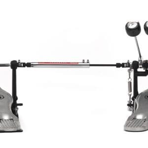 A metal drum pedal with a red knob.