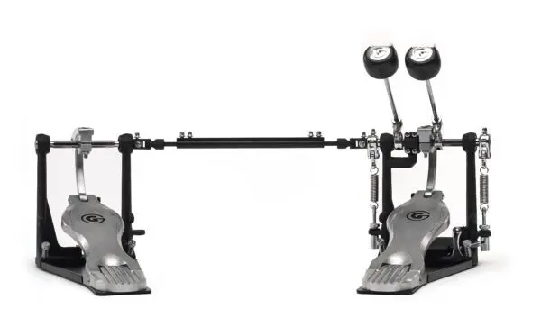 A metal drum pedal with a red knob.