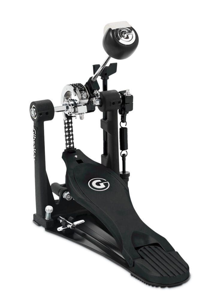 A metal drum pedal with a red knob.