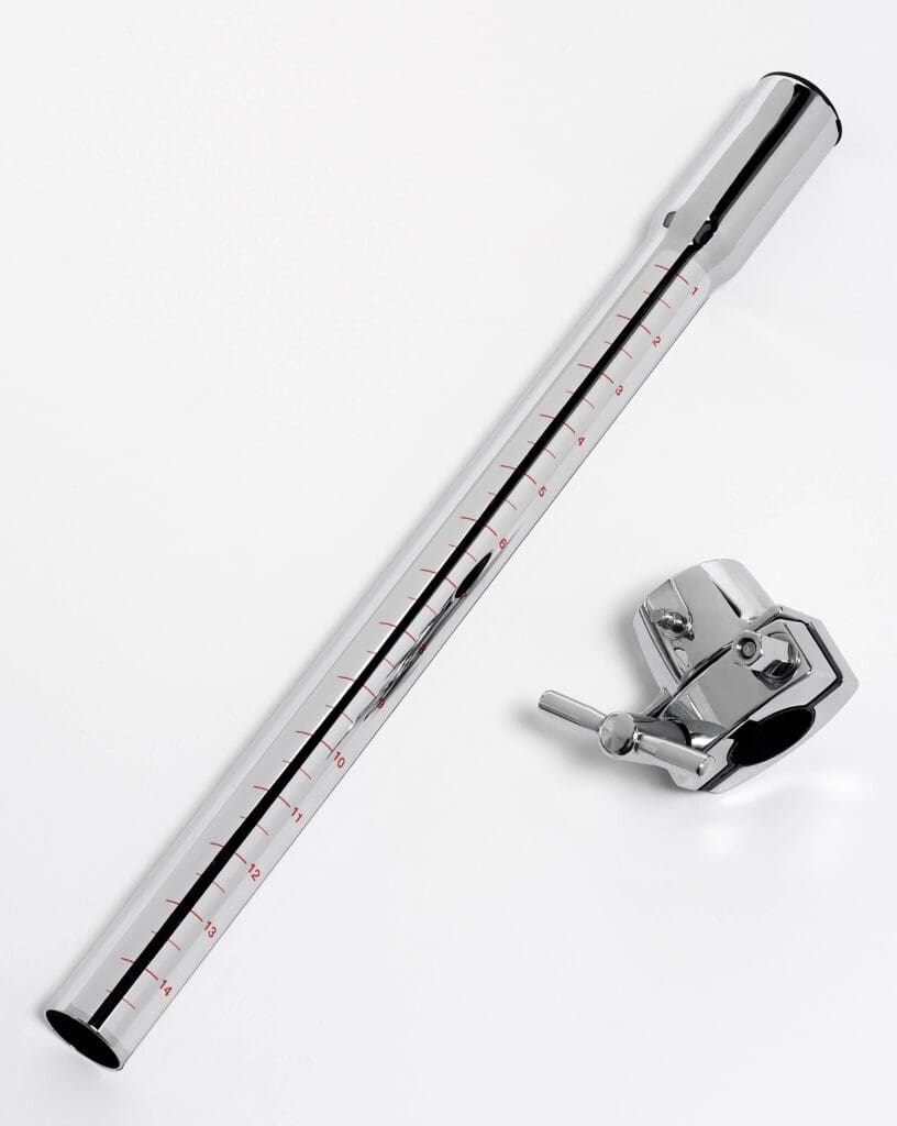 A metal ruler with a handle on a white surface.