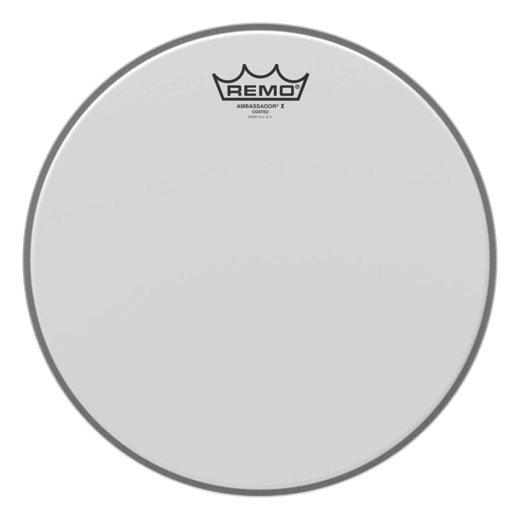 A white drum head with a crown logo.