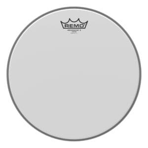 A white drum head with a crown logo.