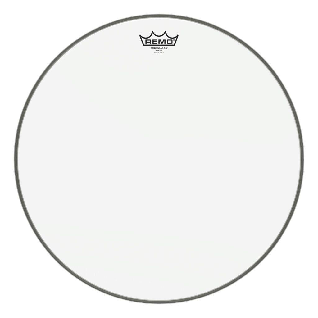 A white drum head with a crown on it.