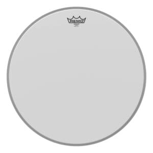 A white drum head with a crown on it.