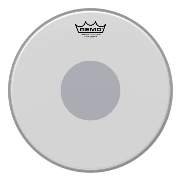 A white drum head with a grey circle on it.