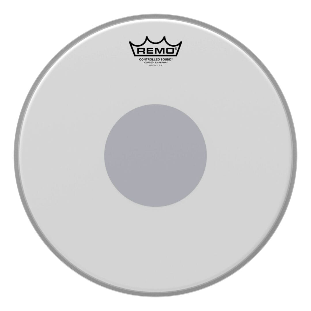 A white drum head with a grey circle on it.