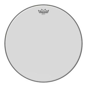 A white drum head with a crown on it.