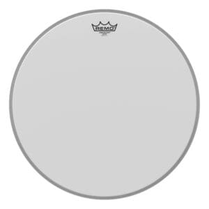 A white drum head with a crown on it.