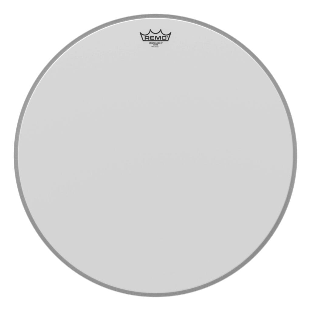 A white drum head with a crown on it.