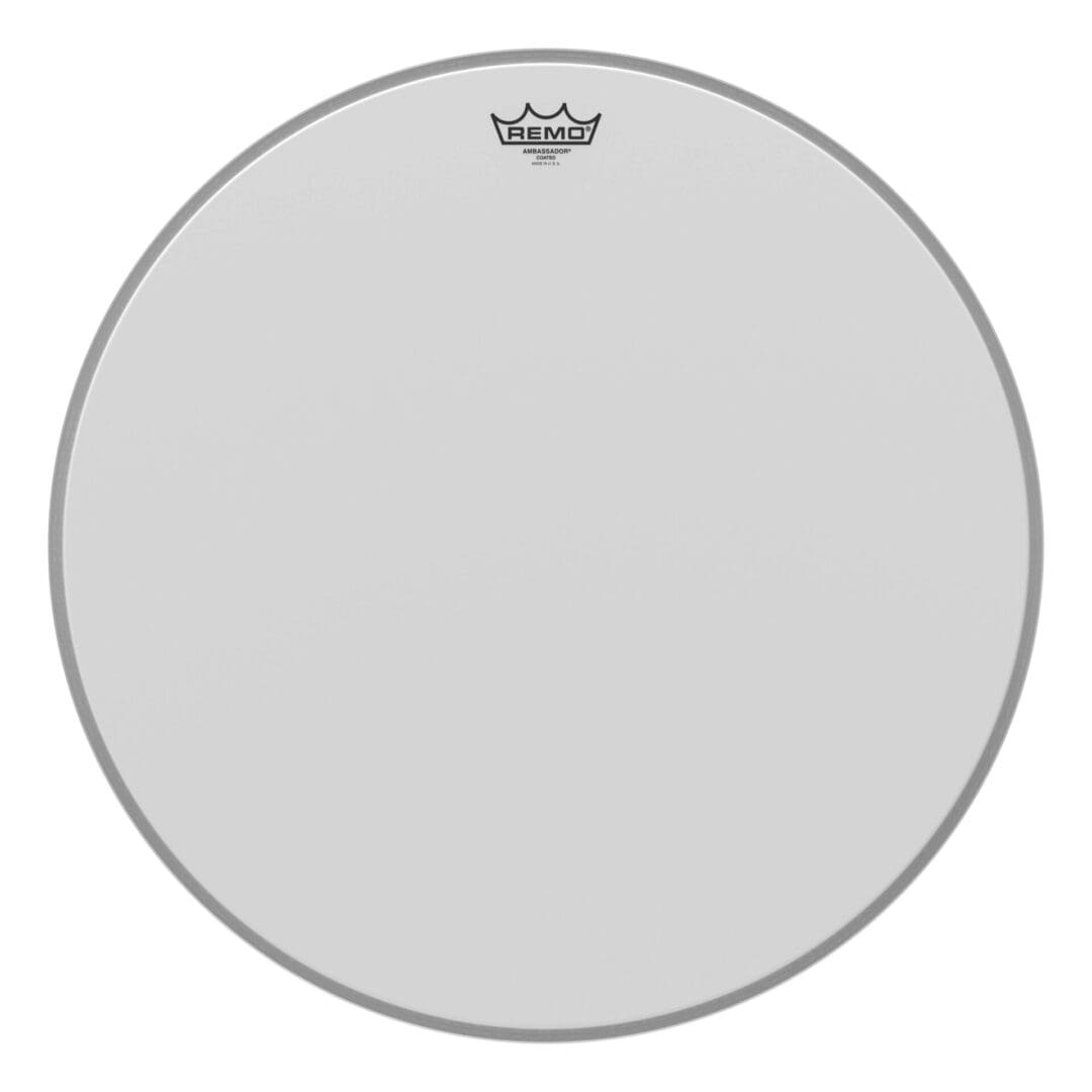 A white drum head with a crown on it.