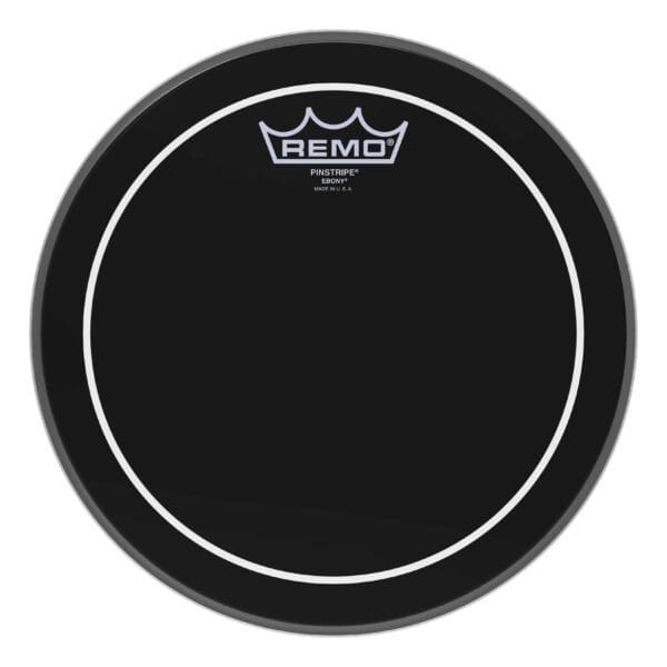 A black drum head with a white logo.