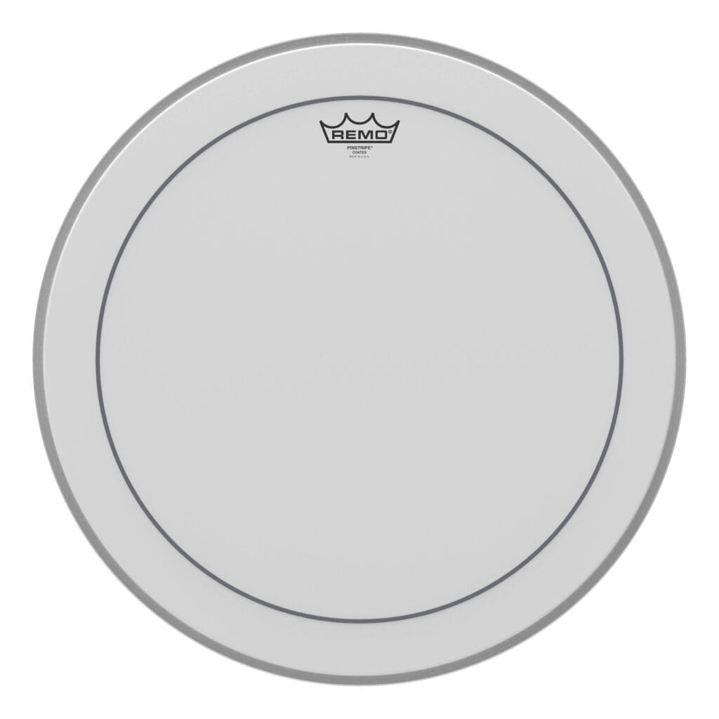 A white drum head with a crown on it.