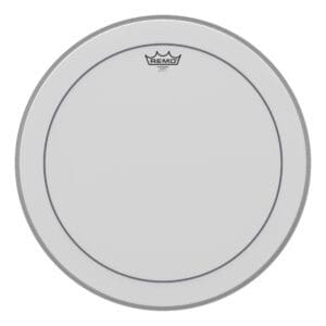 A white drum head with a crown on it.