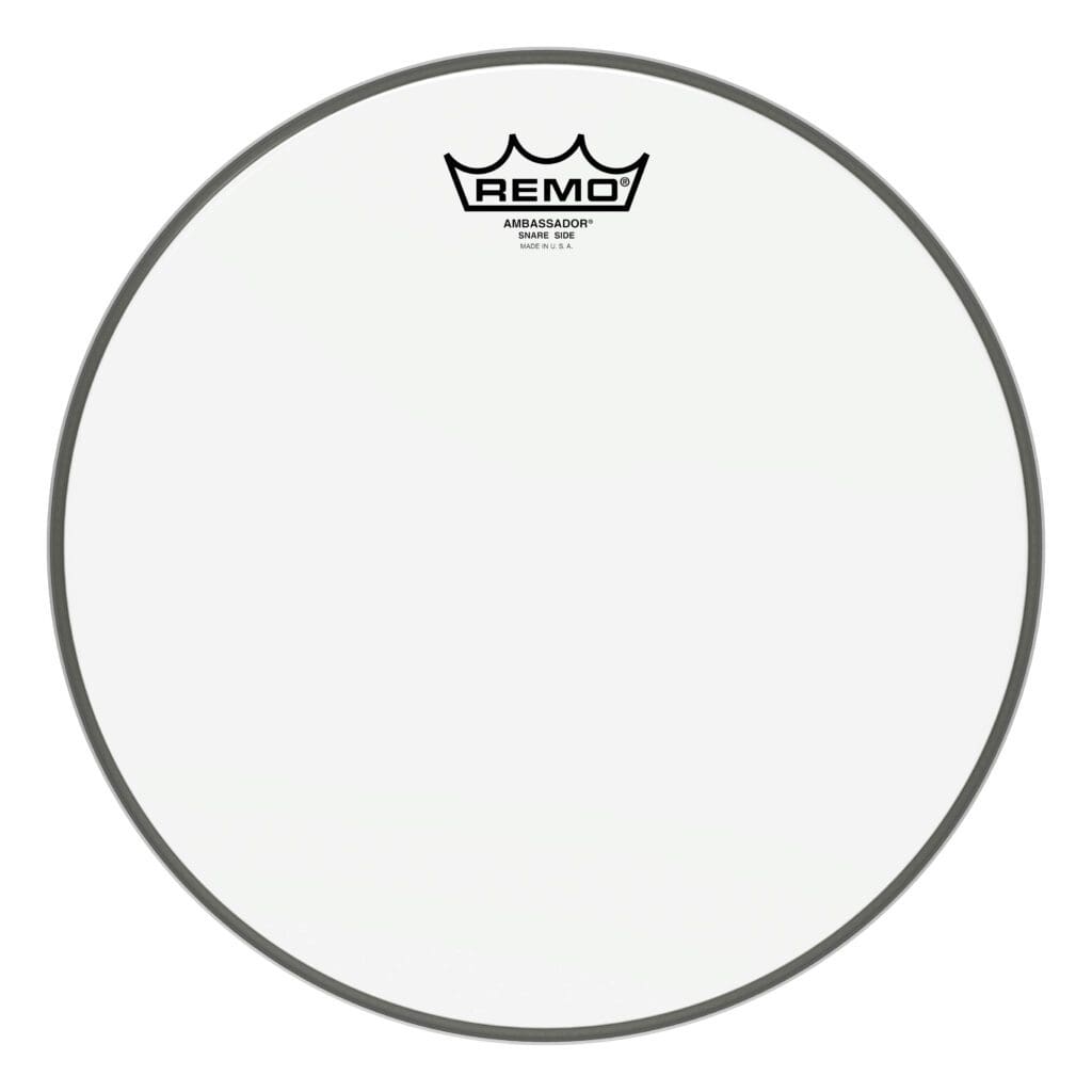 A white drum head with a crown on it.