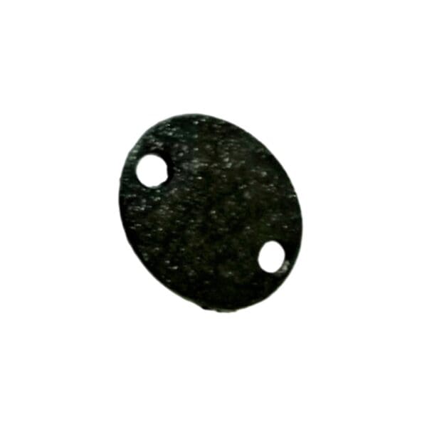 A black circular object with two holes