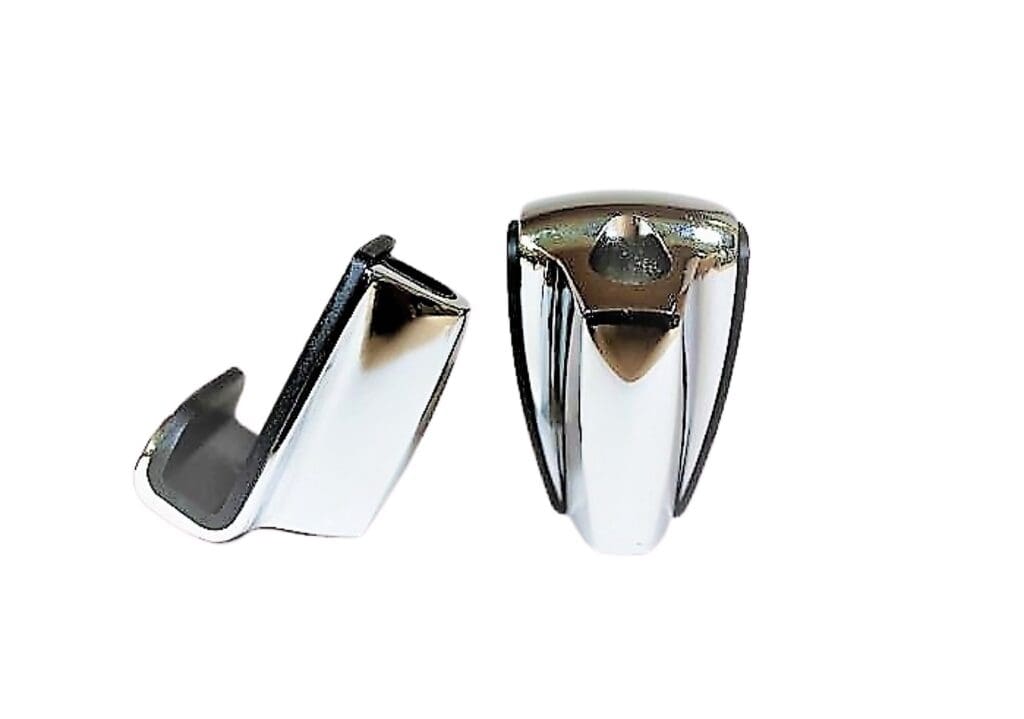 A pair of chrome door handles on a white background.