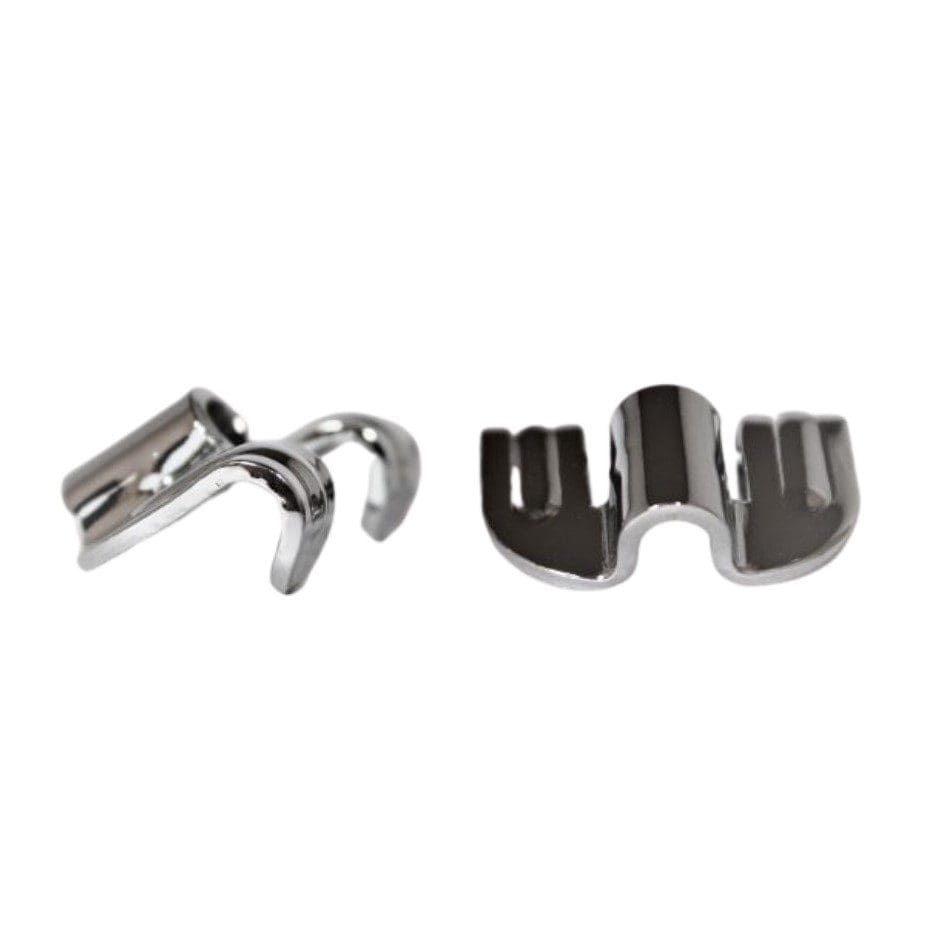 A pair of stainless steel clips on a white background.