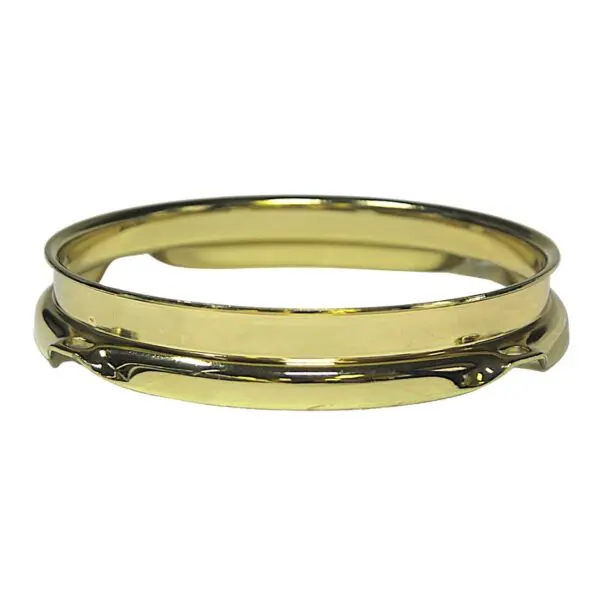 A gold plated bangle ring on a white background.