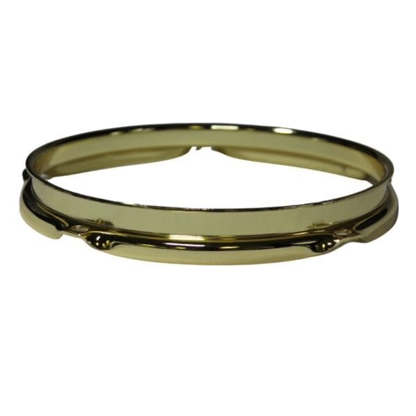 A gold plated bangle on a white background.