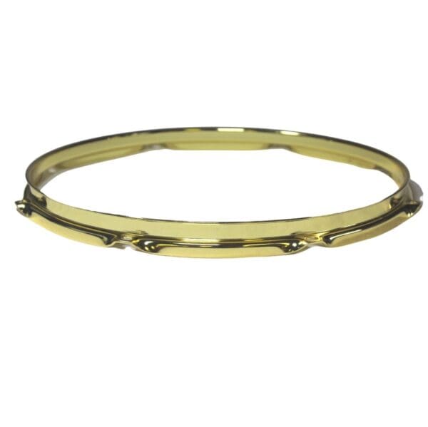 A gold plated bangle bracelet.