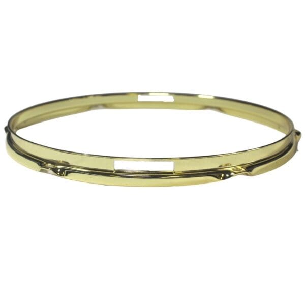 A gold plated bangle on a white background.