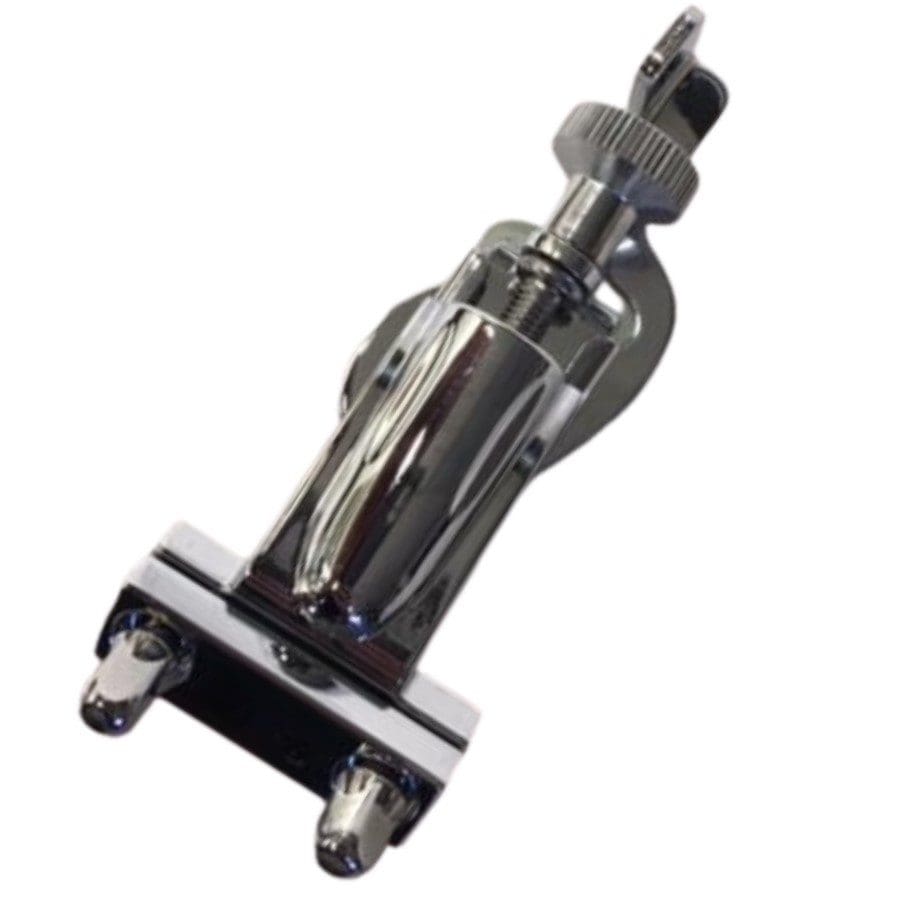 A chrome pedal on a white background.