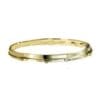 A yellow gold bangle bracelet.
